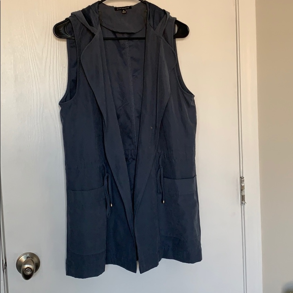 Light blue utility vest with hood